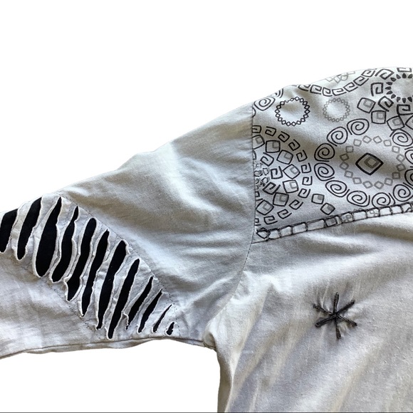 3/4 sleeve of comfy stretchy 100% cotton top in off white and black. - Picture 9 of 16
